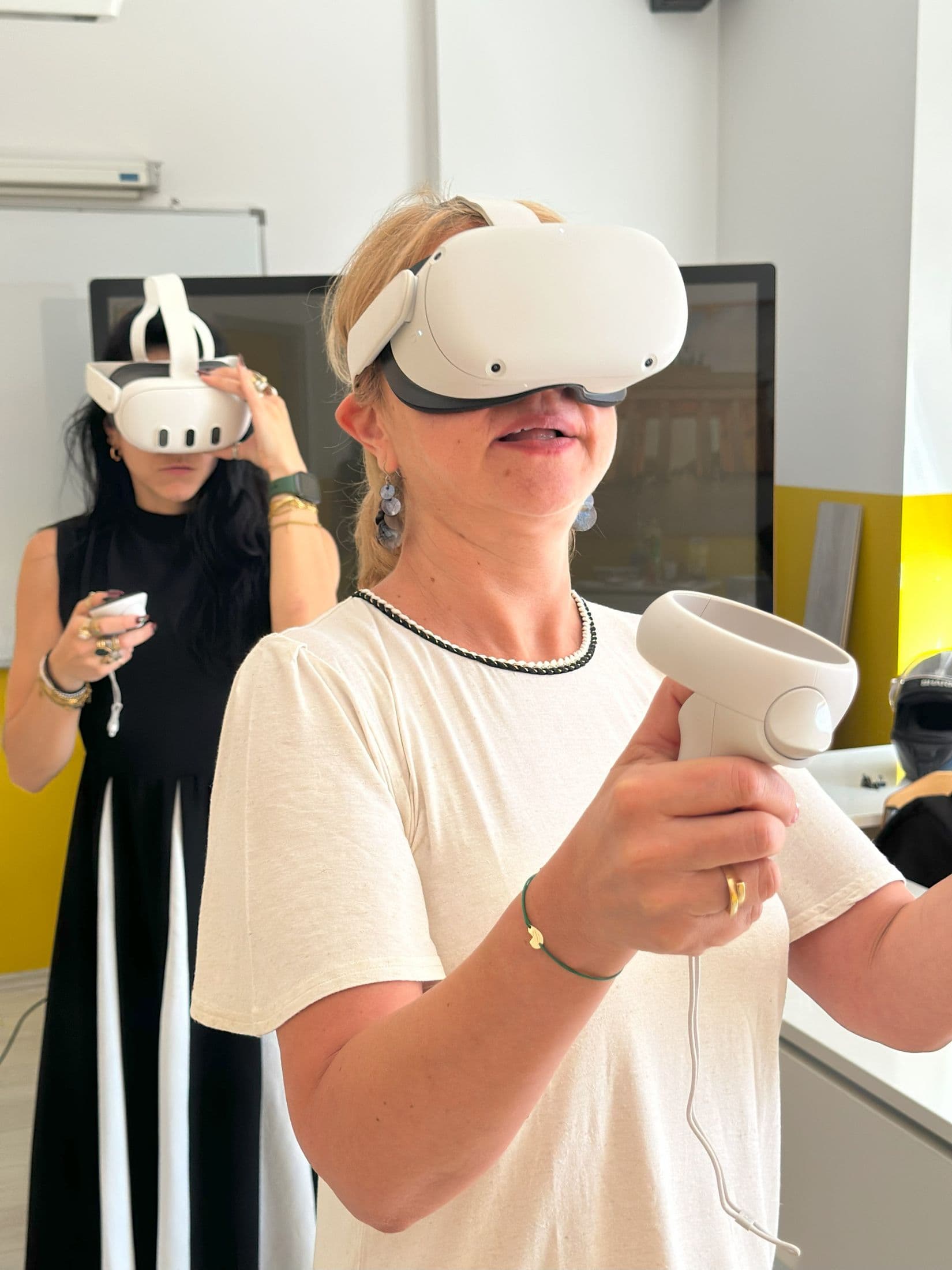 Two teachers in headsets exploring at the same time