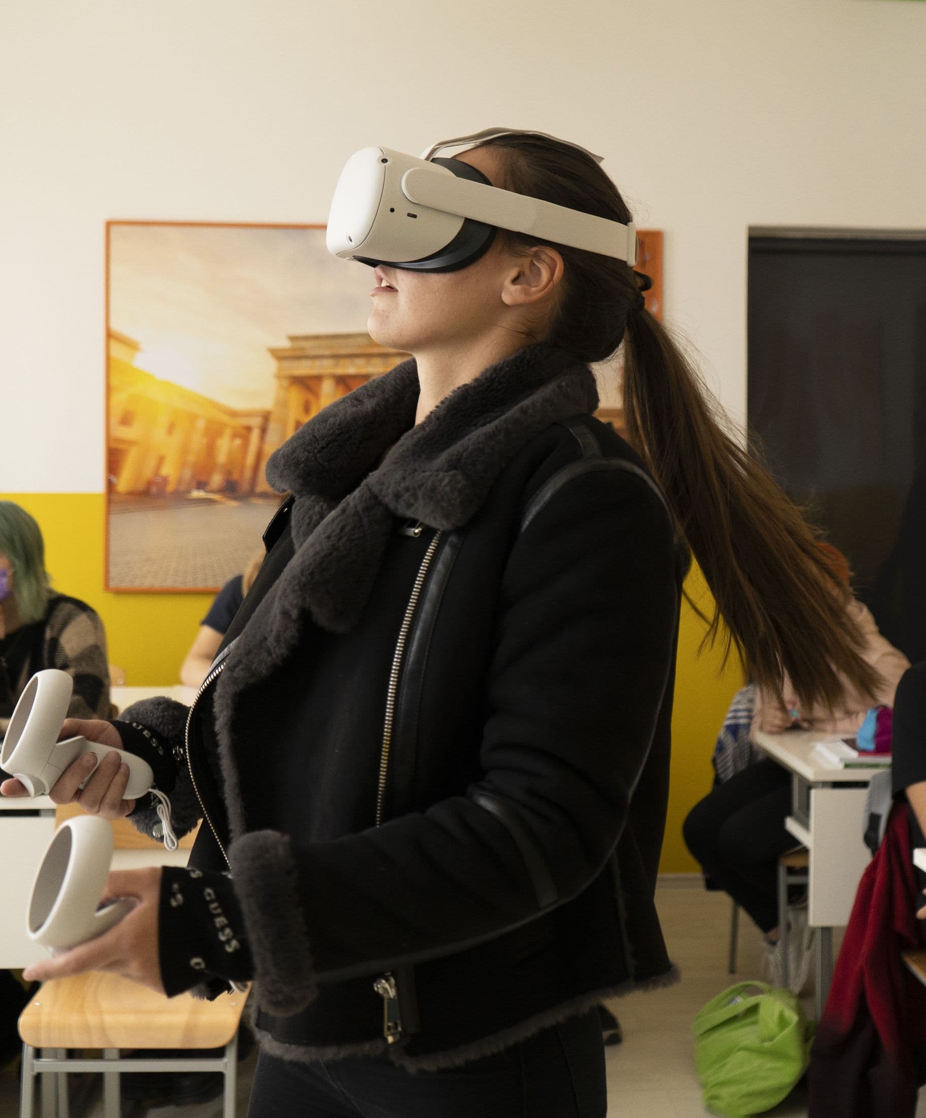 Outside the headset: a student explores while the class works